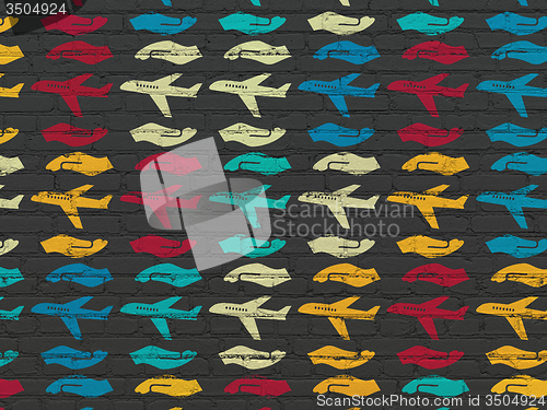 Image of Insurance concept: Airplane And Palm icons on wall background