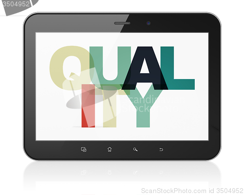 Image of Marketing concept: Tablet Computer with Quality on  display