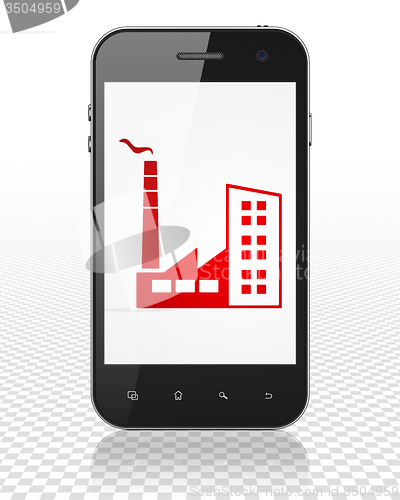 Image of Business concept: Smartphone with Industry Building on display