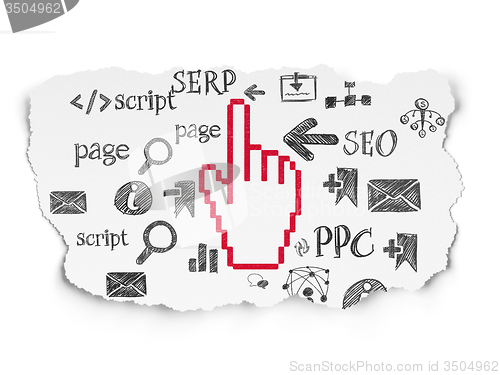Image of Web development concept: Mouse Cursor on Torn Paper background