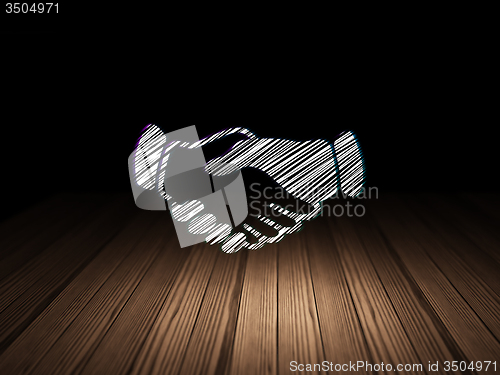 Image of Politics concept: Handshake in grunge dark room