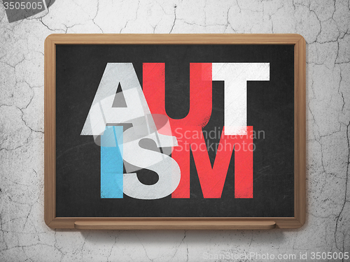 Image of Medicine concept: Autism on School Board background