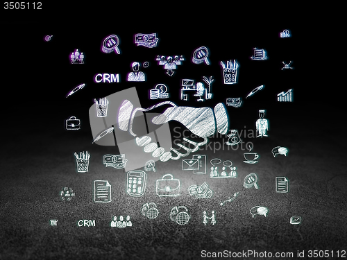 Image of Finance concept: Handshake in grunge dark room