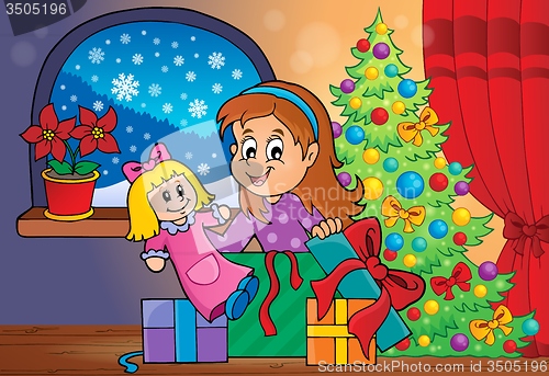 Image of Girl unpacking Christmas gifts theme 2