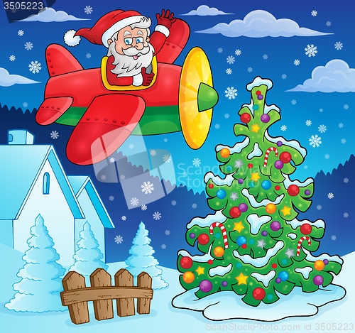 Image of Christmas theme Santa Claus in plane