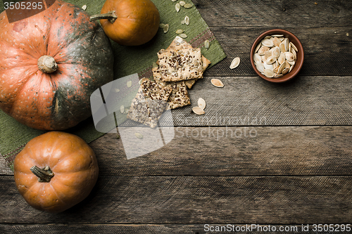 Image of pumpkins with cookies and seeds in Rustic style  