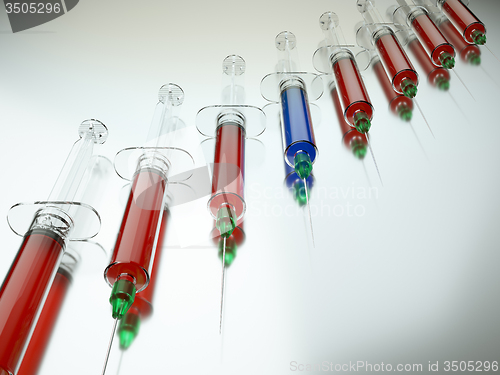 Image of Red syringe among blue ones as right medical choice