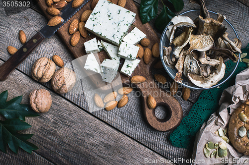 Image of nuts mushrooms, cheese and bread buns for healthy eating 