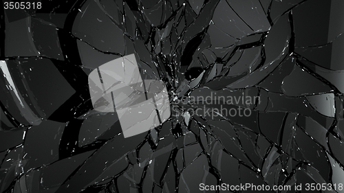 Image of Pieces of splitted or shattered glass on black