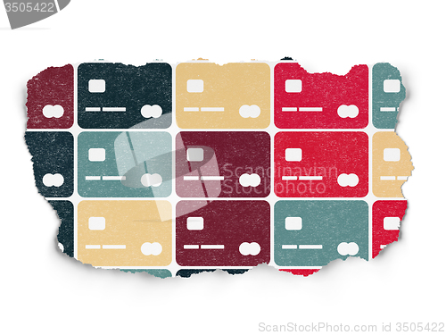 Image of Money concept: Credit Card icons on Torn Paper background