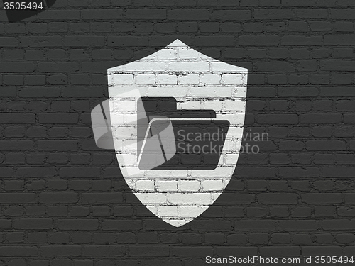 Image of Finance concept: Folder With Shield on wall background
