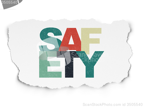 Image of Safety concept: Safety on Torn Paper background