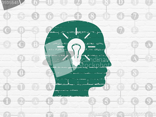 Image of Data concept: Head With Light Bulb on wall background