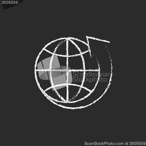 Image of  Earth and arrow around icon drawn in chalk.