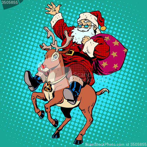 Image of Santa Claus with gifts Christmas reindeer Rudolf