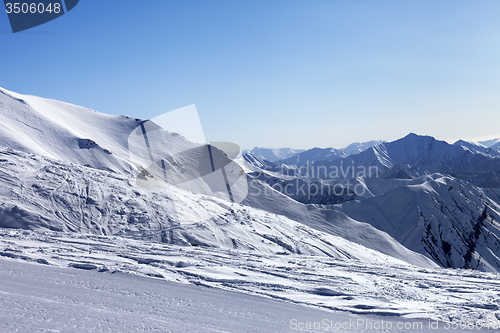 Image of Ski slope in sun morning