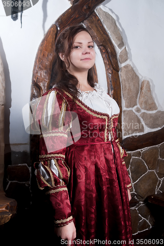 Image of Attractive woman in red dress of retro style