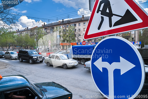 Image of Road signs in street under reconstruction