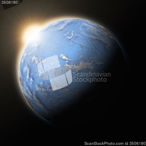 Image of Sun over Pacific Ocean on planet Earth