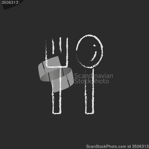 Image of Spoon and fork icon drawn in chalk.