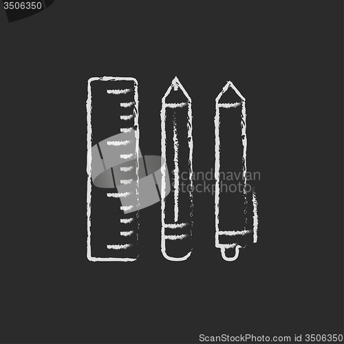 Image of School supplies icon drawn in chalk.