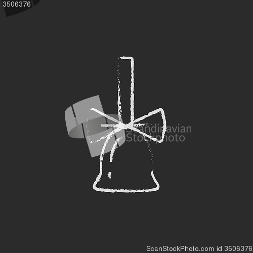 Image of School bell with ribbon icon drawn in chalk.