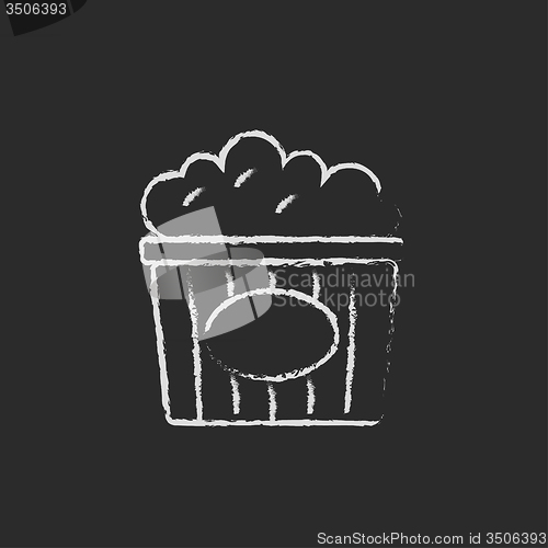 Image of Popcorn icon drawn in chalk.