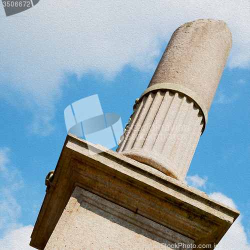 Image of old column in the cloudy sky of europe italy