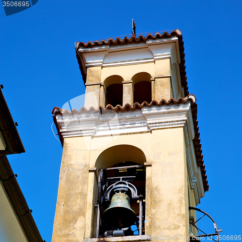 Image of ancien clock tower in italy europe old  stone and bell