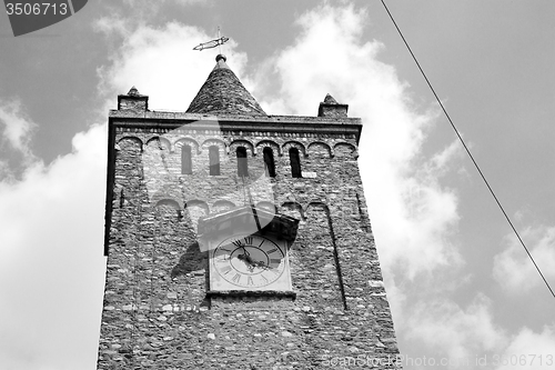Image of ancien clock tower in italy europe old  stone and bell