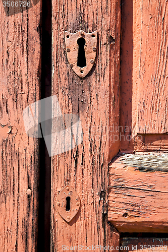Image of door    in italy   traditional  texture nail