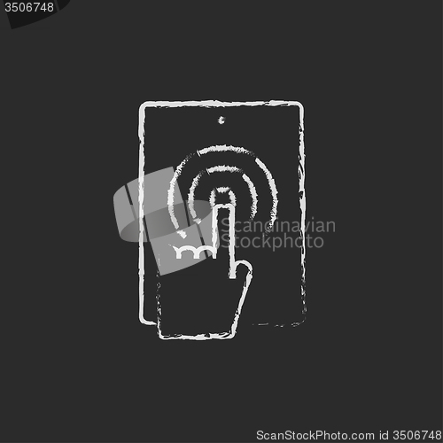 Image of Touch screen tablet icon drawn in chalk.
