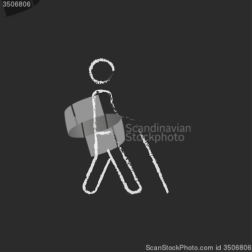 Image of Blind man with stick icon drawn in chalk.