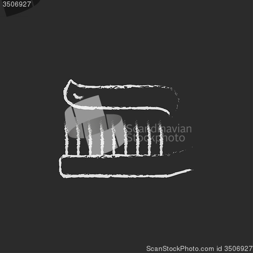 Image of Toothbrush with toothpaste icon drawn in chalk.