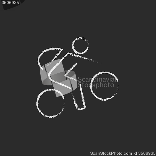 Image of Bike and cyclist icon drawn in chalk.