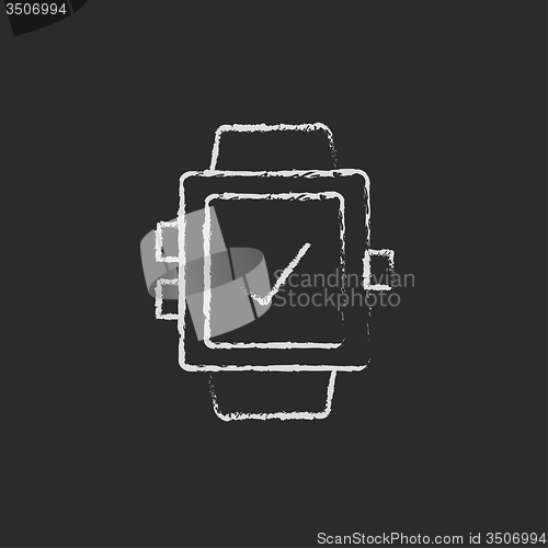 Image of Smartwatch with check sign icon drawn in chalk.