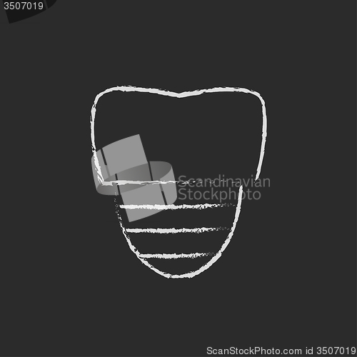 Image of Tooth implant icon drawn in chalk.