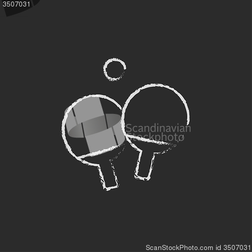 Image of Table tennis racket and ball icon drawn in chalk.