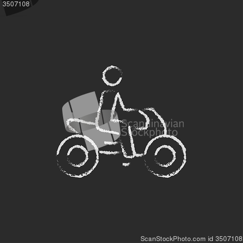 Image of Rider on a motorcycle icon drawn in chalk.