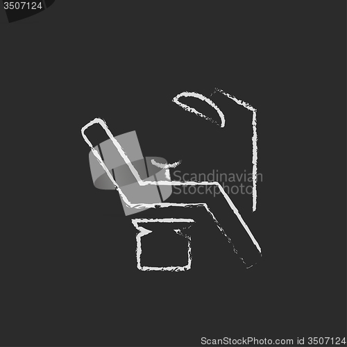 Image of Dental chair icon drawn in chalk.