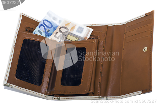 Image of wallet, bright orange and a little bit of money on the white bac