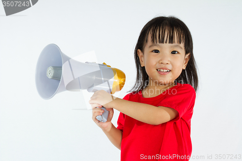 Image of Asian Chinese little girl holding megaphone