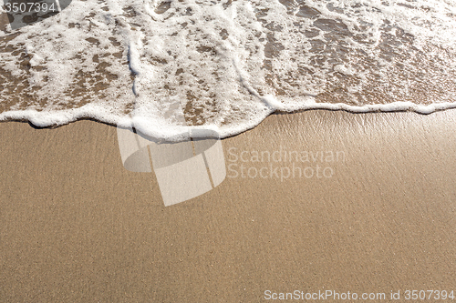 Image of Tropical beach wave close