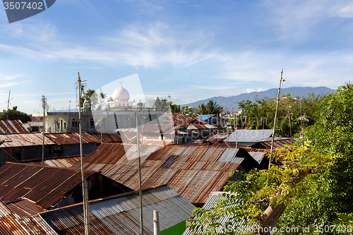 Image of roof of poor houses by the river