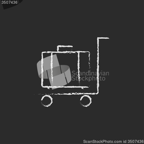 Image of Luggage on a trolley icon drawn in chalk.