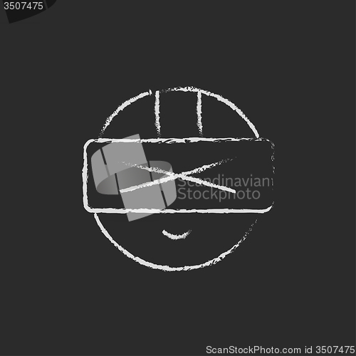 Image of Man wearing virtual reality headset icon drawn in chalk.