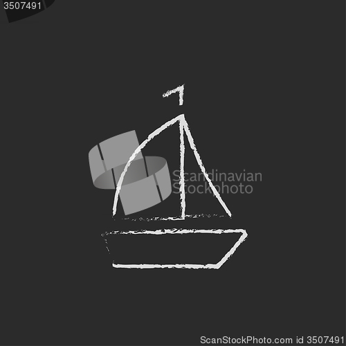 Image of Sailboat icon drawn in chalk.