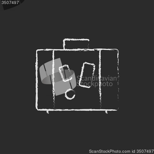 Image of Suitcase icon drawn in chalk.