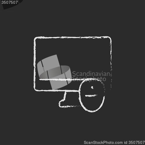 Image of Monitor and computer mouse icon drawn in chalk.
