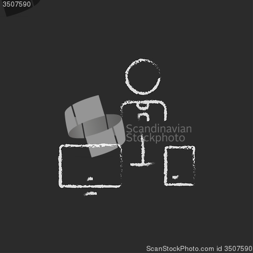 Image of Man with computer set icon drawn in chalk.